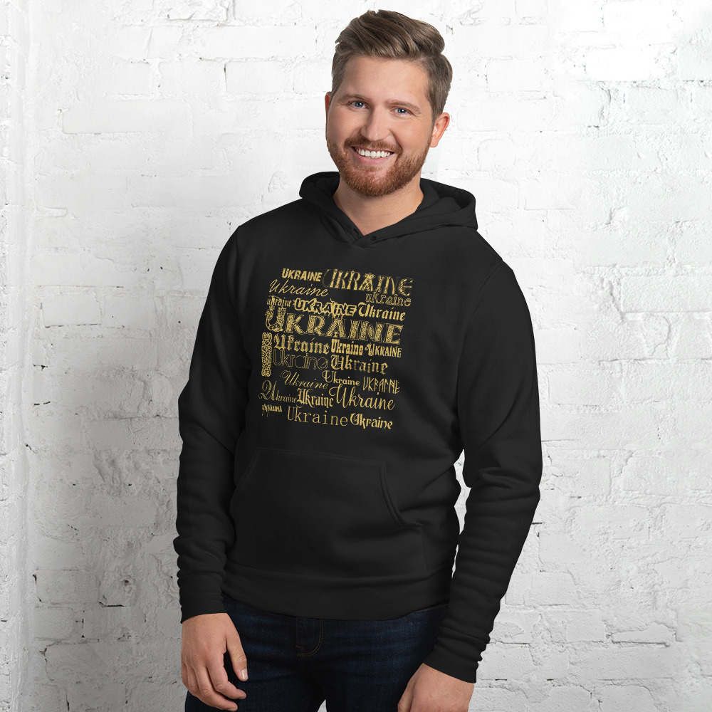 Hoodie in the style of a newspaper with the inscription UA